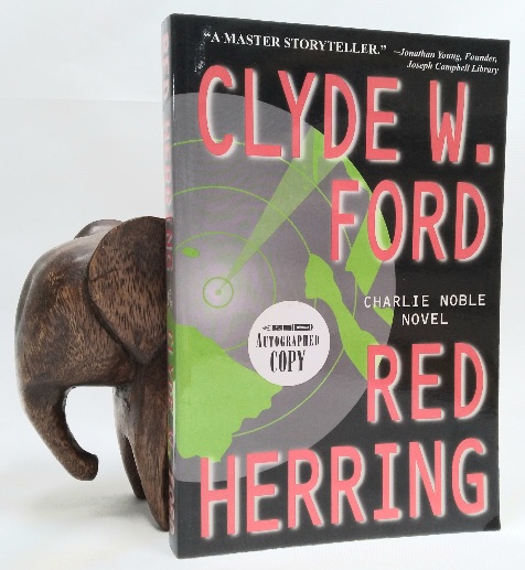 A lot of two (2) Clyde W. Ford novels: Red Herring; Precious Cargo
