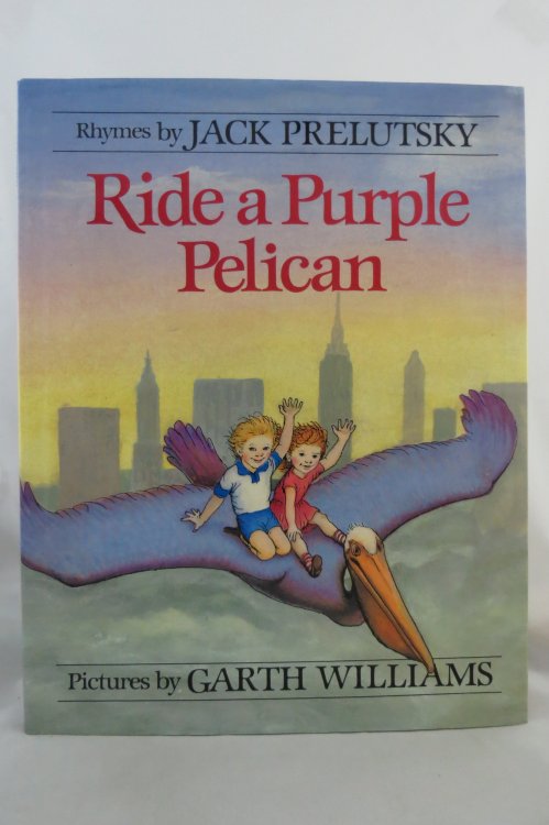 RIDE A PURPLE PELICAN (DJ protected by a brand new, clear, acid-free mylar cover) (Signed by Author)