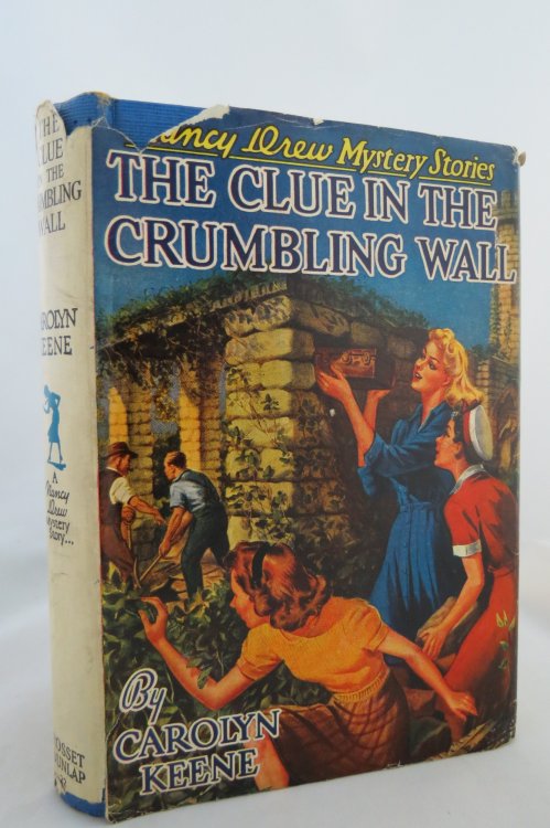 THE CLUE IN THE CRUMBLING WALL (NANCY DREW) (DJ protected by a brand new, clear, acid-free mylar cover)