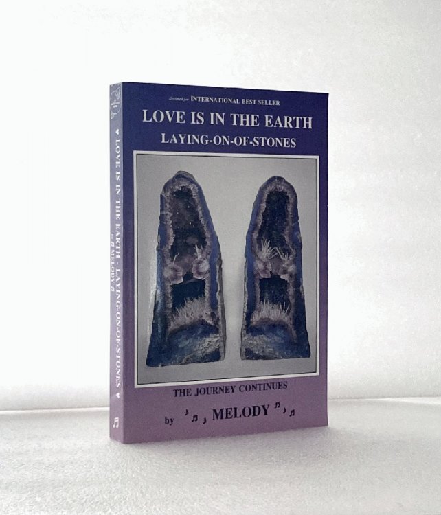 Love Is in the Earth: Laying on of Stones [Paperback]