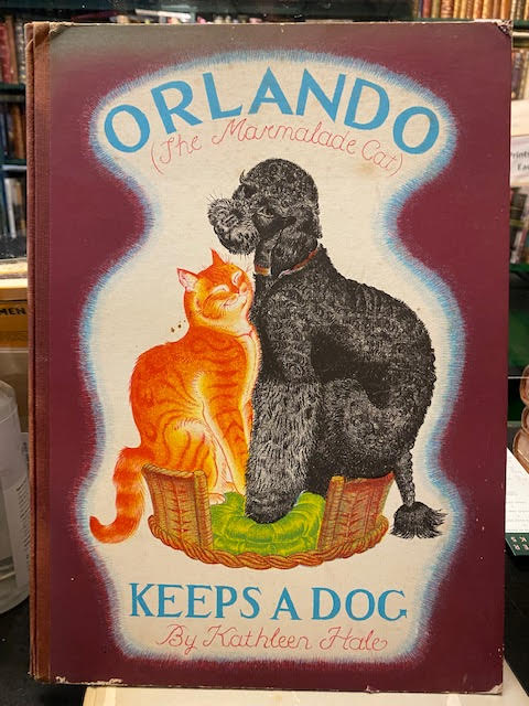 Orlando the Marmalade Cat Keeps a Dog