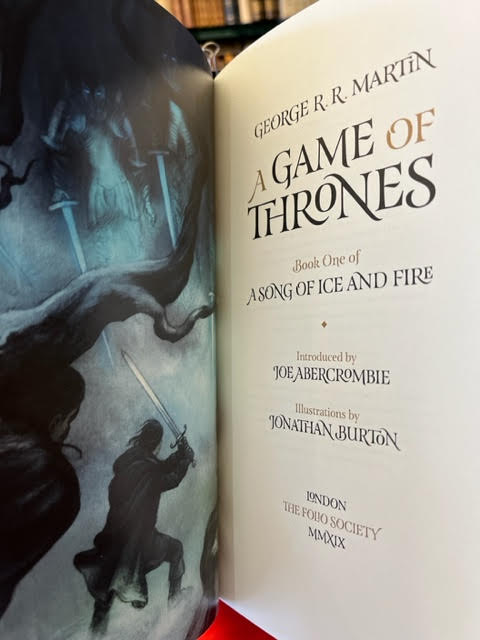 A Game of Thrones, (in two volumes with supplementary map of the known world)