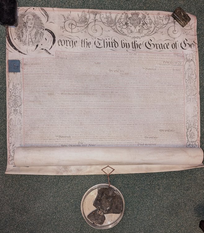 Vellum Baronetcy document on two sheets with remains of a wax seal.