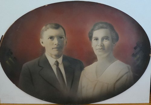 COLLECTION OF THREE (3) LARGE OVAL-SHAPED HAND-TINTED PHOTOGRAPHS OF THE JANDL FAMILY IN THE 1920s.