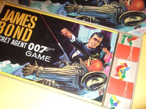 2 Items ( Book - 1966) and James Bond 007 Boardgame, 1964 ): The Man with the Golden Gun ( Toronto, PAN 1st Printing ) / James Bond Secret Agent 007 Game ( London, Ontario - Somerville Industries / Milton Bradley )