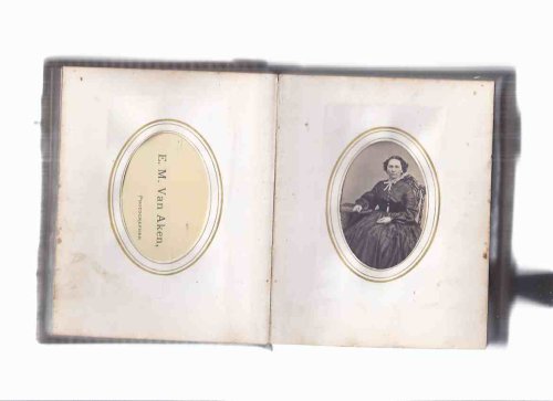 American Photograph Album (ca 1870 )( mainly NEW YORK state photographers, 1 Philadelphia Pennsylvania, 1 Eldora Iowa, 1 Jackson Michigan )( Tooled Leather, Gilt Design, Embossed Edges, Brass Hinges with Floral Decorations, 25 family portrait photos )