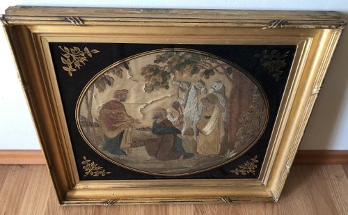 A scene, painted and embroidered upon silk, of people at an oasis.