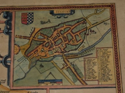RUTLANDSHIRE With OUKHAM and STANFORD. Original Antique Engraved Hand Coloured Map of RUTLANDSHIRE. With, Arms of Nobles and County Crest. Plan of County Towns OUKHAM and STANFORD. Illustrations of Scribes to bottom corners.