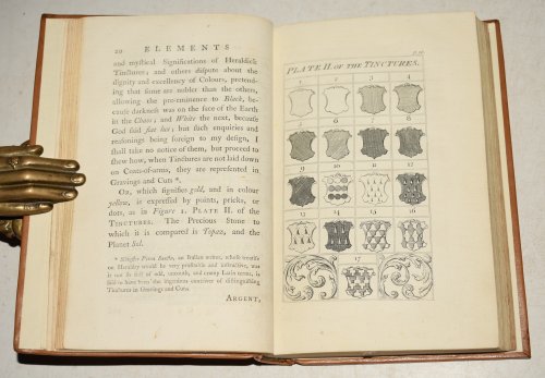 The Elements of Heraldry. Containing A Clear Definintion, and concise historical account of that ancient, useful and entertaining science. The Origin and divers kinds. the several sorts of Escutcheons. The Marks. Embellished with several fine Cuts, and Twenty Four Copper-Plates containing above Five