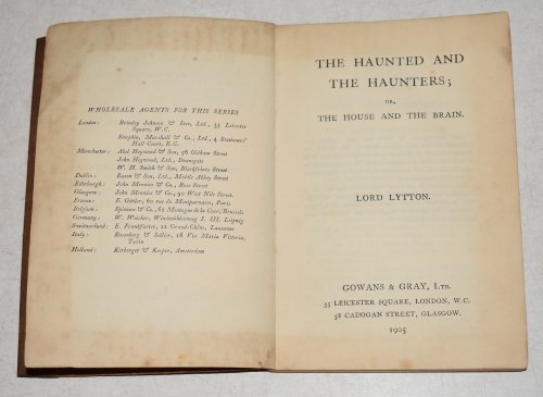 THE HAUNTED AND THE HAUNTERS. (or the House and the Brain). Issued as "Gowans International Library Number 1." The first separate book publication of this famous supernatural tale. It was first published in Blackwood's Magazine in 1859 and first appeared in book form in TALES FROM BLACKWOO