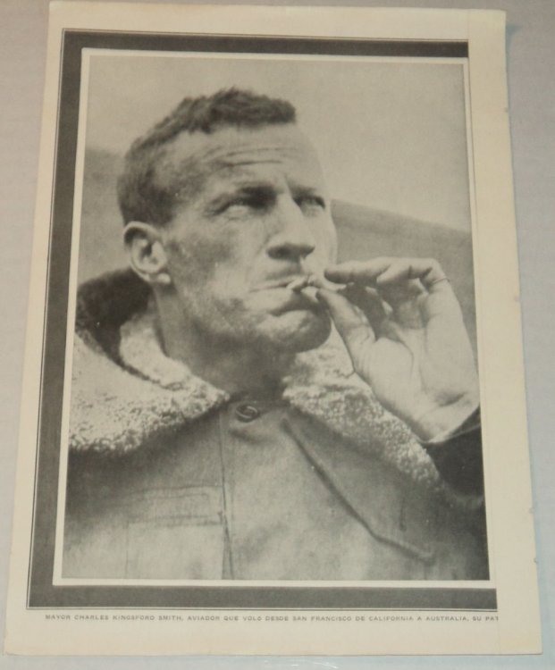 A vintage magazine photographic portrait of the AUSTRALIAN AVIATOR CHARLES KINGSFORD SMITH, who made the first Trans-Pacific flight from the United States to Australia.