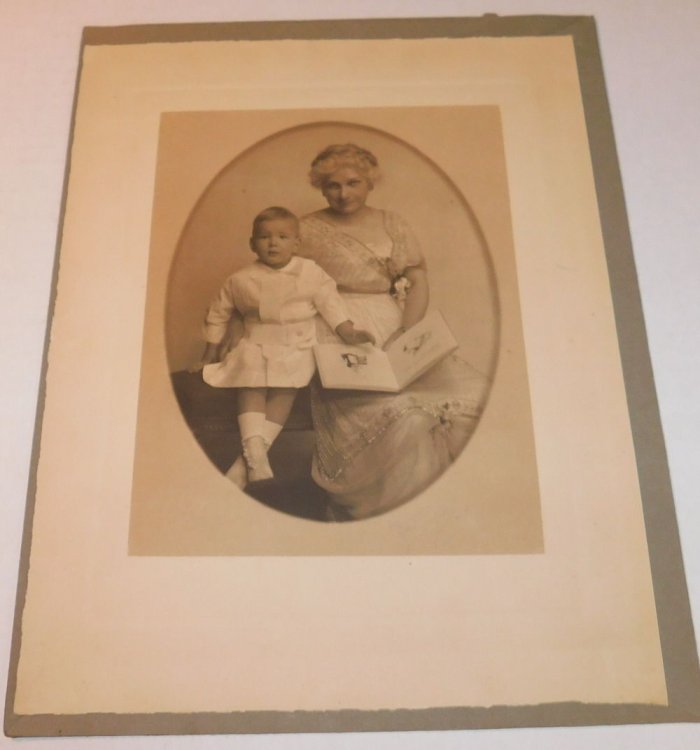 A RARE PHOTOGRAPH of a mother reading to her child by THE MISSES SELBY.