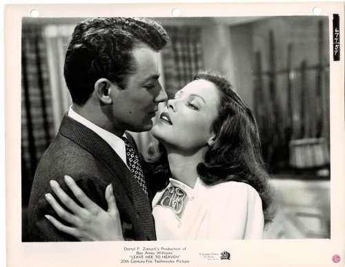 A VINTAGE PUBLICITY PHOTOGRAPH of the Glamorous Hollywood Movie Star GENE TIERNEY with CORNELL WILDE in a scene from 