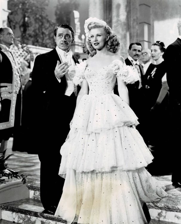 A VINTAGE CONTINUITY LAYOUT PHOTOGRAPH depicting GINGER ROGERS and EDUARDO CIANELLI in a scene from 