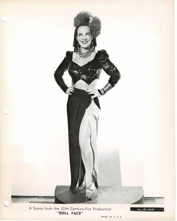 A VINTAGE PUBLICITY GLAMOUR PHOTOGRAPH of CARMEN MIRANDA in a scene from 20th Century-Fox's 