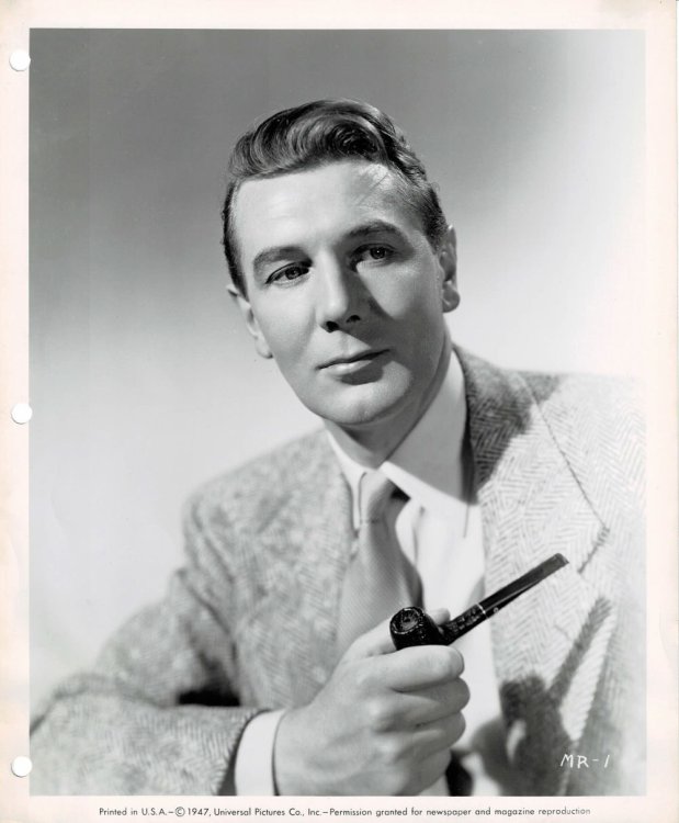 A VINTAGE PUBLICITY PHOTOGRAPH of British Stage & Screen Actor and Director MICHAEL REDGRAVE who is starring in his first Hollywood film, Fritz Lang's 
