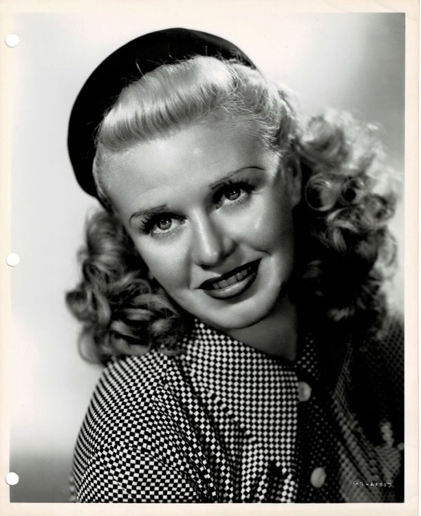 A VINTAGE PUBLICITY PHOTOGRAPH of the Glamorous Hollywood Movie Star GINGER ROGERS who starred in RKO's 