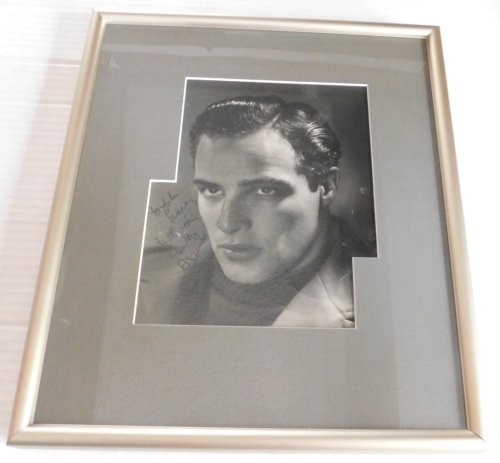 A RARE INSCRIBED AND SIGNED PHOTOGRAPH OF A YOUTHFUL MARLON BRANDO.