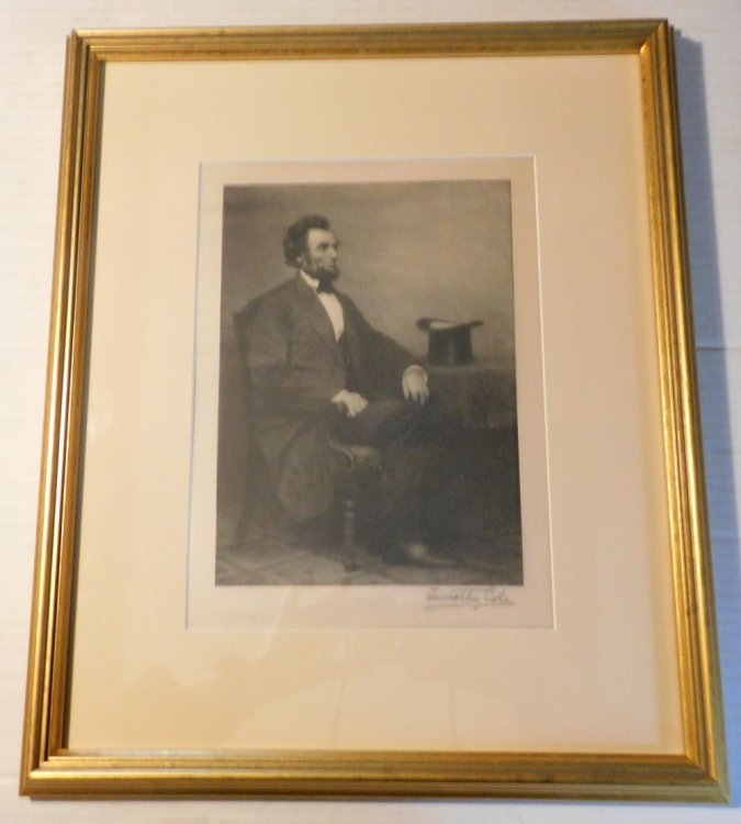 AN ORIGINAL SIGNED WOOD ENGRAVING of ABRAHAM LINCOLN by TIMOTHY COLE, after a photograph by Matthew Brady.