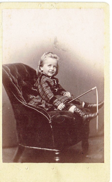 ORIGINAL CARTE-DE-VISITE PHOTOGRAPH BY G. VOLKERLING OF A YOUNG BOY WITH A RIDING CROP, IDENTIFIED ON THE VERSO AS ALBERT W. SPEYERS.