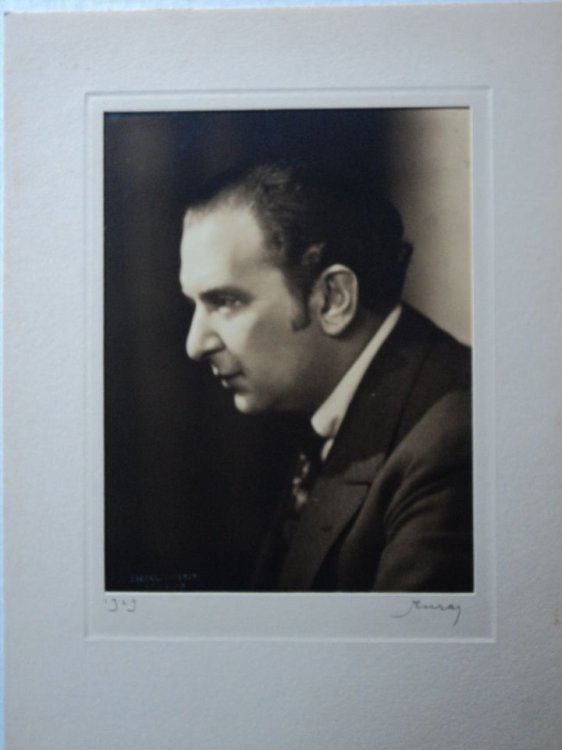 A SUPERB SEPIA TONED PHOTOGRAPH PORTRAIT OF THE GREAT CLASSICAL CONDUCTOR FRITZ REINER BY NICKOLAS MURAY, DATED AND SIGNED BY THE PHOTOGRAPHER.