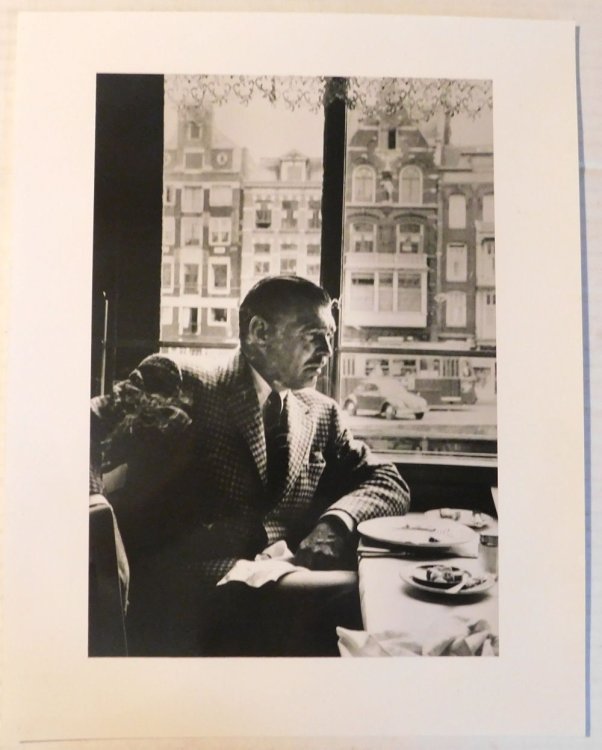 Image for A BEAUTIFUL ORIGINAL PHOTOGRAPH OF CLARK GABLE SEATED AT A RESTAURANT'S WINDOW TABLE IN ARNHEM HOLLAND WHILE FILMING BETRAYED. A BEAUTIFUL ORIGINAL PHOTOGRAPH OF CLARK GABLE SEATED AT A RESTAURANT'S WINDOW TABLE IN ARNHEM HOLLAND WHILE FILMING BETRAYED.