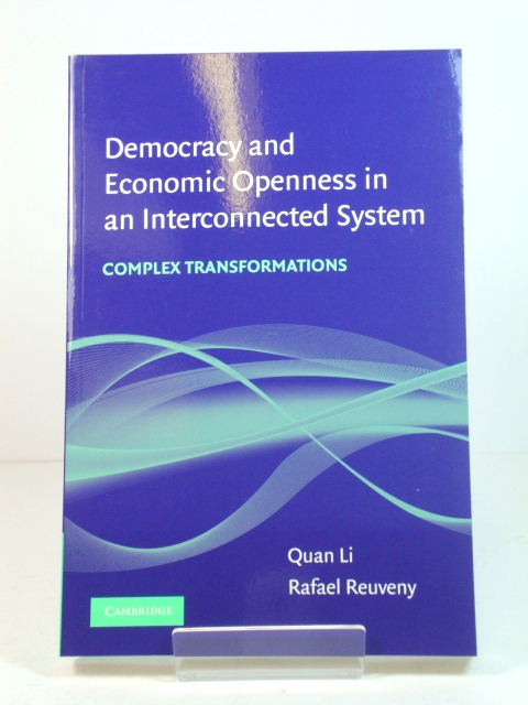Democracy and Economic Openness in an Interconnected System