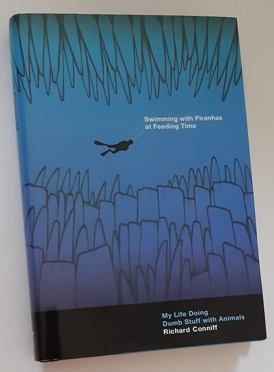 Image for SWIMMING WITH PIRANHAS at Feeding Time: My Life Doing Dumb Stuff with Animals SWIMMING WITH PIRANHAS at Feeding Time: My Life Doing Dumb Stuff with Animals