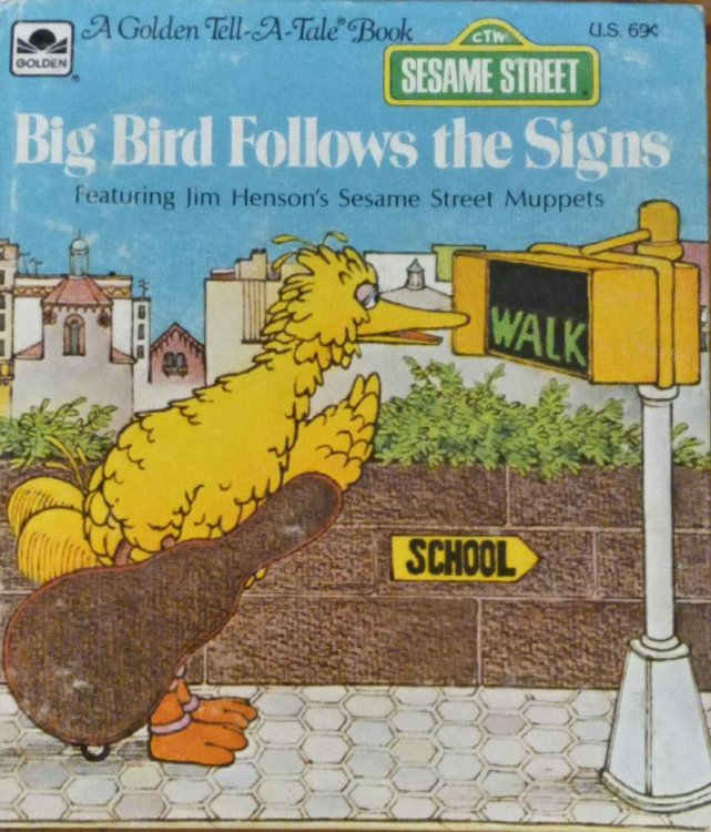 Big Bird follows the signs: Featuring Jim Henson's Sesame Street muppets (Golden Tell-a-tale book)