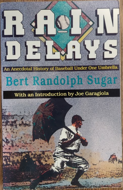 Rain Delays: An Anecdotal History of Baseball Under One Umbrella
