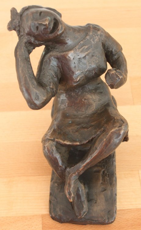 Bronze Figure: Seated Girl Laughing.