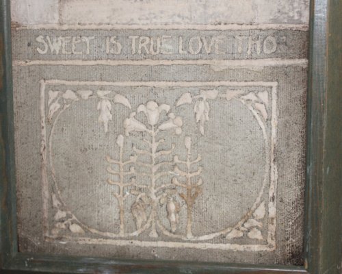 Two gesso panels illustrating Tennyson's Lancelot and Elaine incorporating the defining phrase of the poem and of their association “Sweet is true love tho given in vain, in vain.”