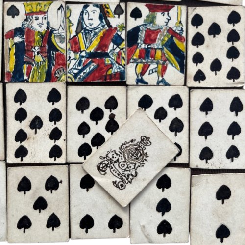 Complete Miniature Deck of 52 Playing Cards.