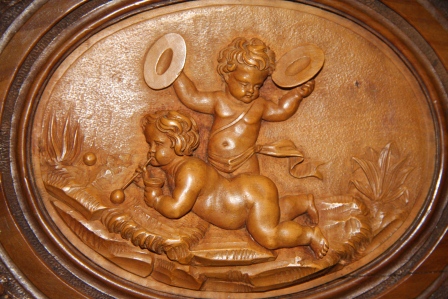 Black Forest Photo Album with An Unusual Relief Depicting Putti, One Blowing Bubbles, the Other, Playing Cymbals