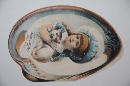 Shell-shaped folding trade card or small booklet for Waller & McSorley, 245 Grand St., N.Y., Importers and Manufacturers, ladies' and children's garments, etc.