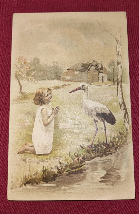Young Girl with Stork UDB colour lithograph Postcard