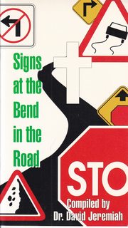 Signs at the Bend in the Road