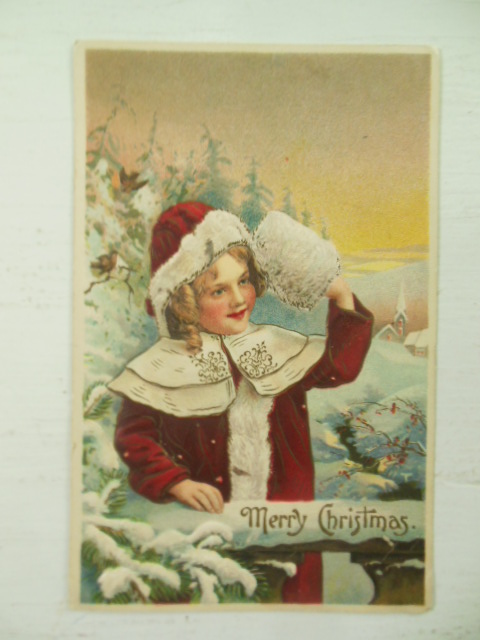 German Embossed Postcard Merry Christmas Girl in Red Coat & Muff by Fence
