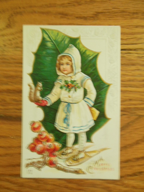 Merry Christmas Girl on Snowshoes Squirrel, Holly Postcard 1914