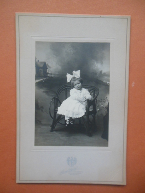 Photograph Little girl with Big Hair Bow Sitting on Bench (1910 Alonzo P. Young)