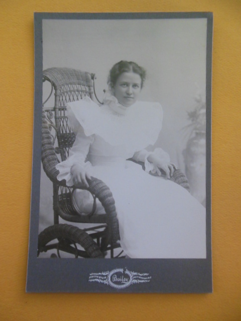 Cabinet Photo Woman in Ruffled Dress in Wicker Wheelchair (Bailey, Rochester, N.Y.)