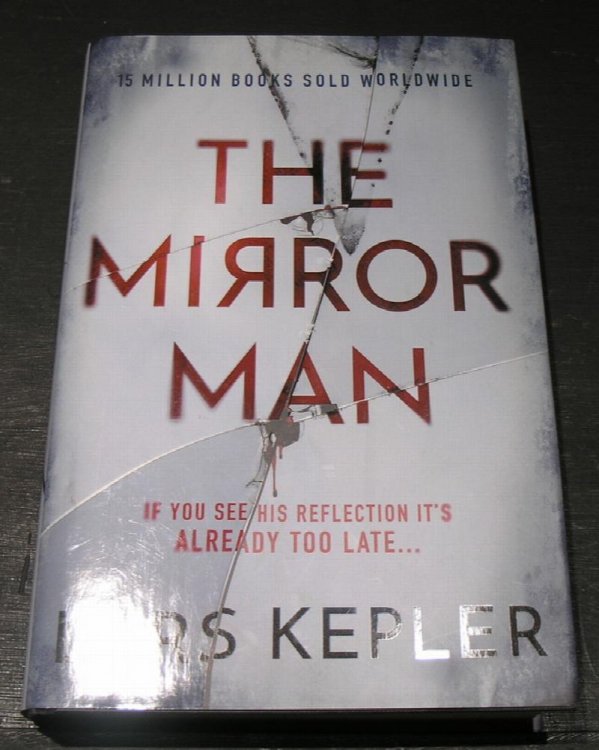 The Mirror Man: if you see his reflection it's already to late.