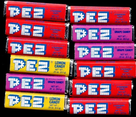 12 Pez Candies. Unopened.