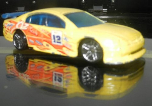 2000 Hot Wheels SS Commodore VT Yellow with blue tint