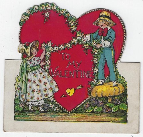 VINTAGE HEART CUT OUT VALENTINE CARD WITH BOY AND GIRL HANGING GARLAND
