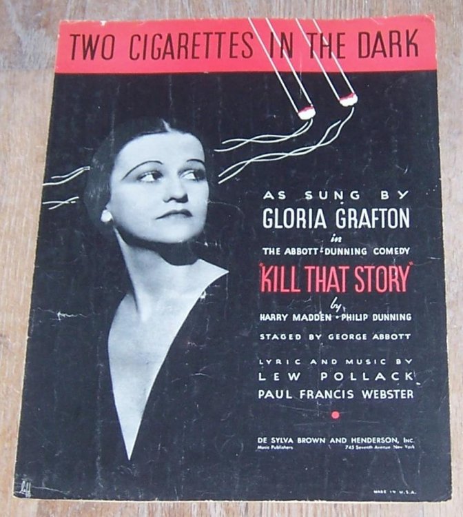 TWO CIGARETTES IN THE DARK