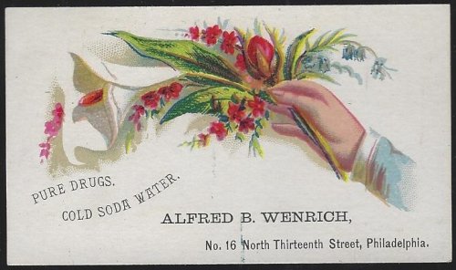 VICTORIAN TRADE CARD FOR ALFRED B. WENRICH, PHILADELPHIA WITH HAND AND FLOWERS