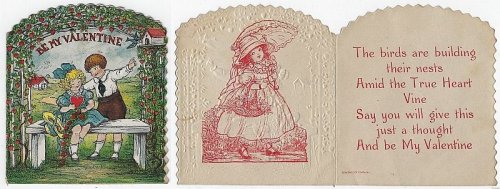 VINTAGE VALENTINE CARD WITH LITTLE BOY AND GIRL SITTING ON BENCH UNDER ROSE ARBOR