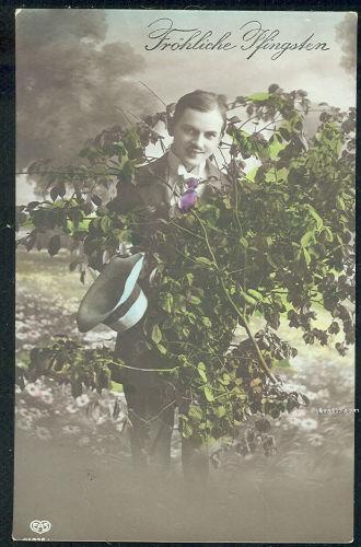 GERMAN POSTCARD OF MAN WITH FLOWERS FROHLICHE PFINGSTON