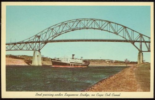 BOAT PASSING UNDER SAGAMORE BRIDGE ON CAPE COD CANAL